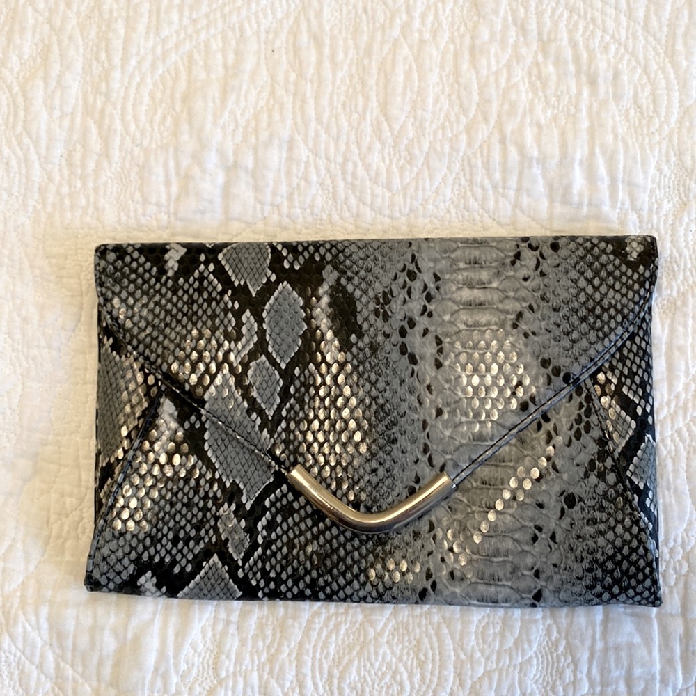Snake print with snap front close envelope clutch